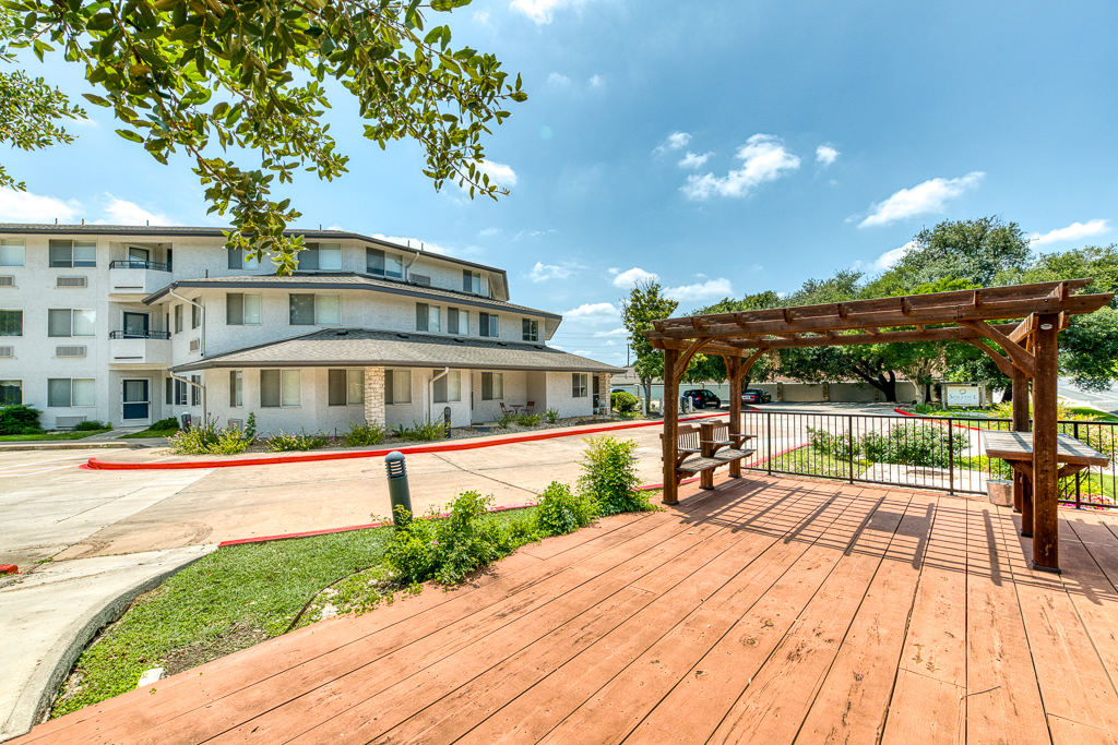 Outdoor seating area with building in the background