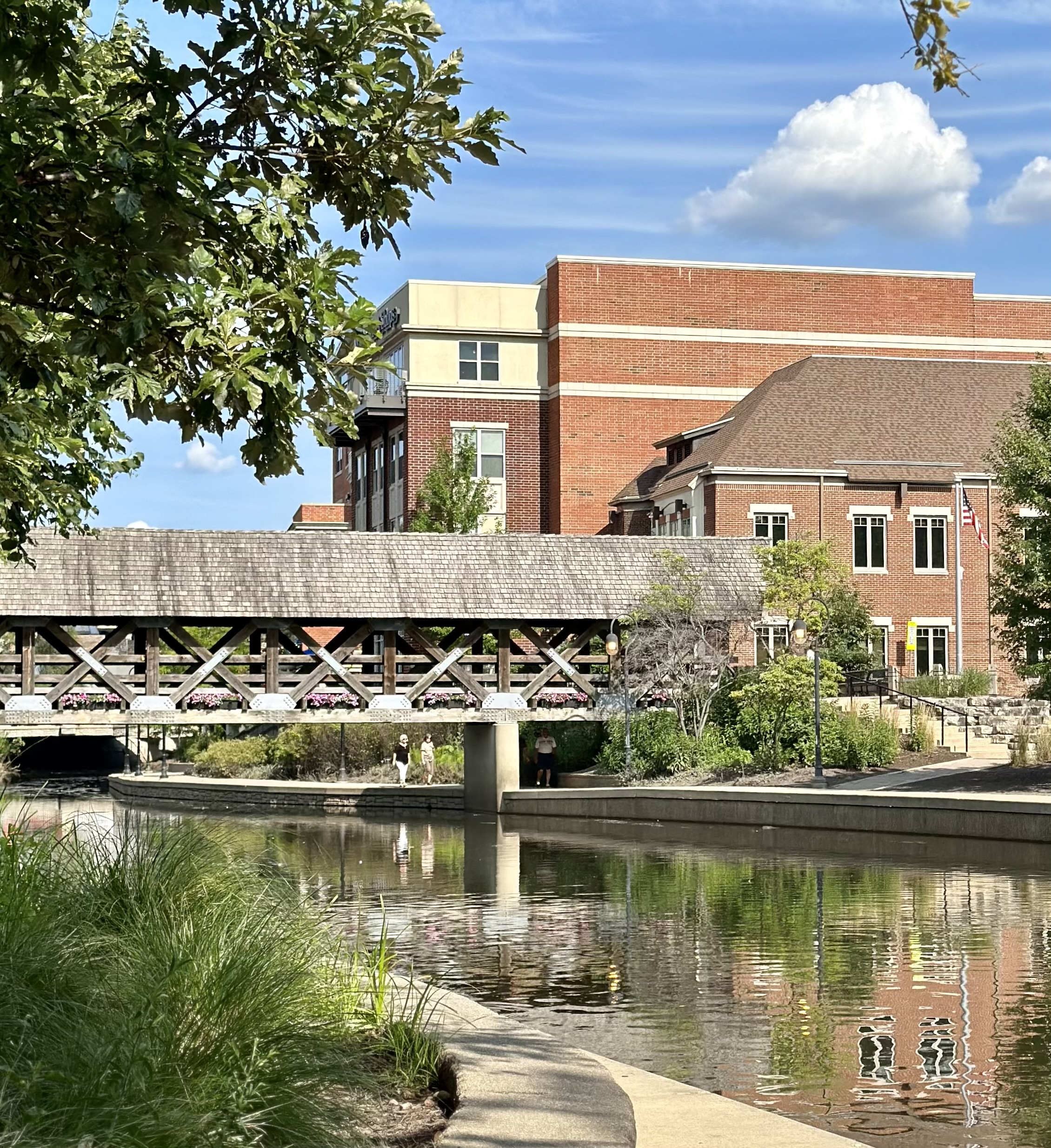 Exterior view of the facility by a serene waterway