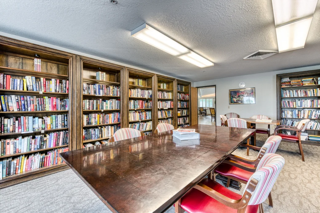 Interior view of a library with bookshelves and seating