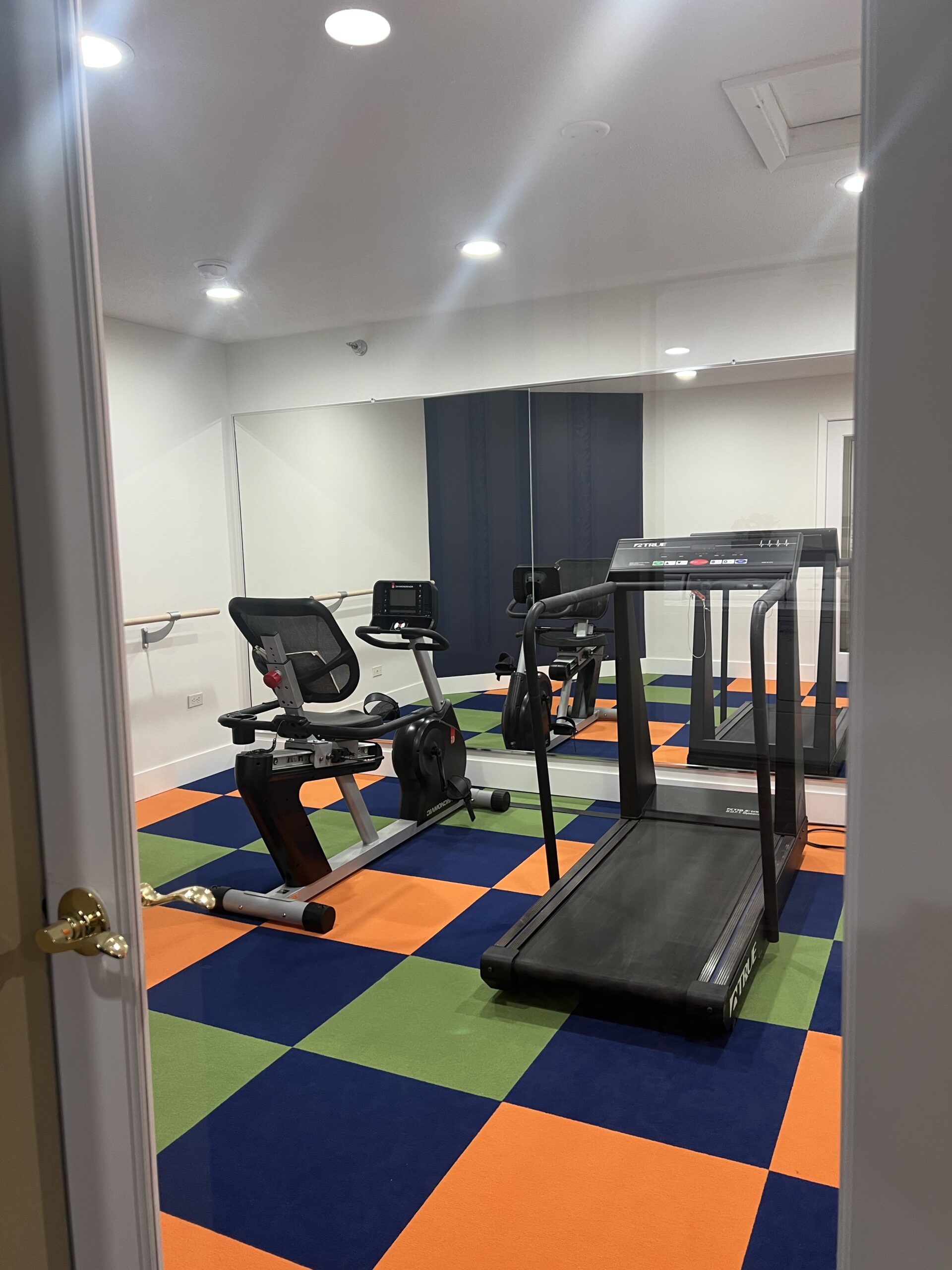 Indoor fitness area with exercise equipment