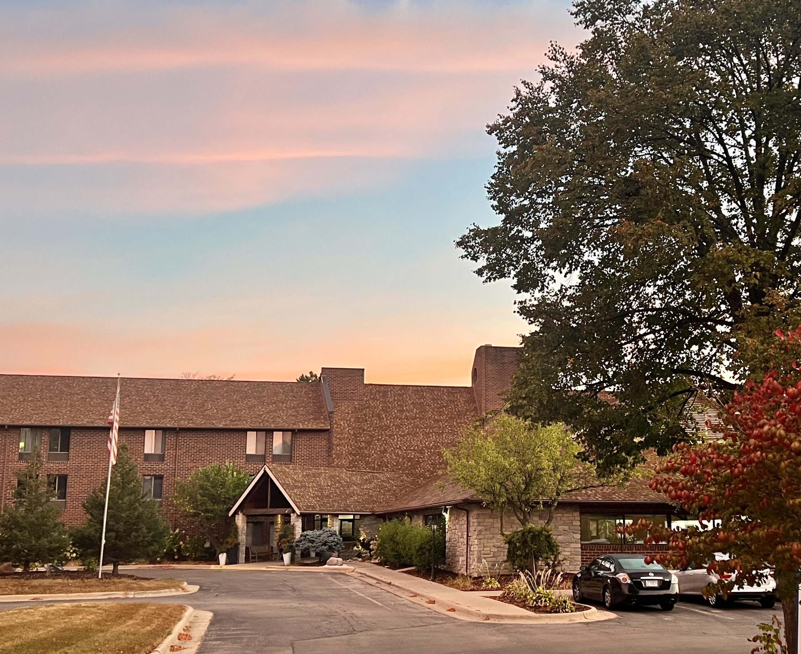 Exterior view of the facility at sunset
