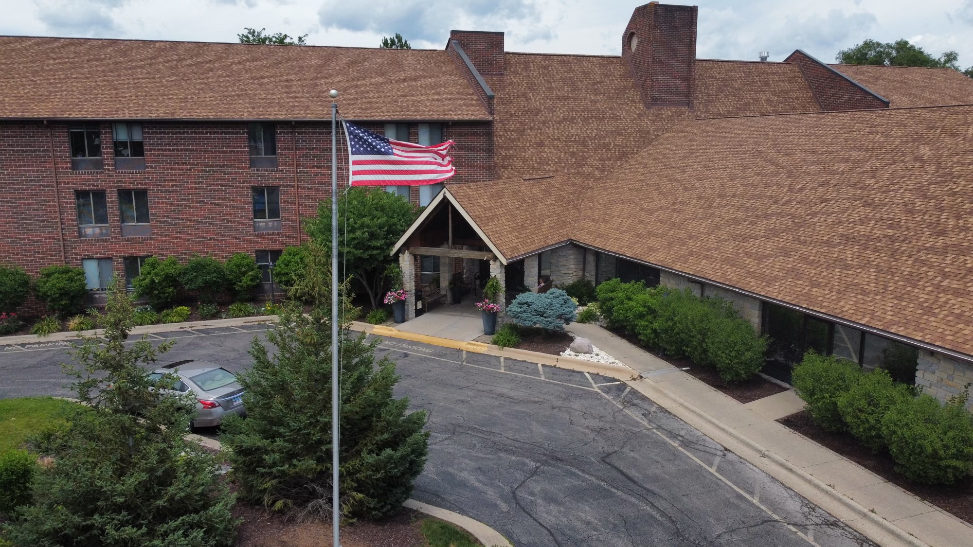 Exterior view of Independence Village with American flag