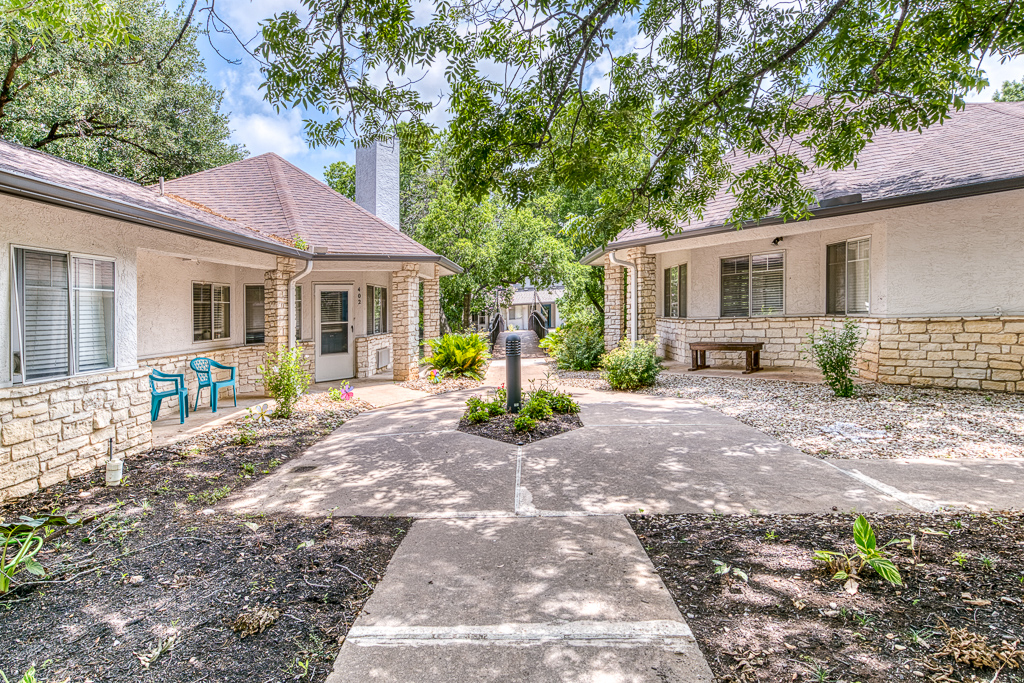 Outdoor courtyard with seating and pathways