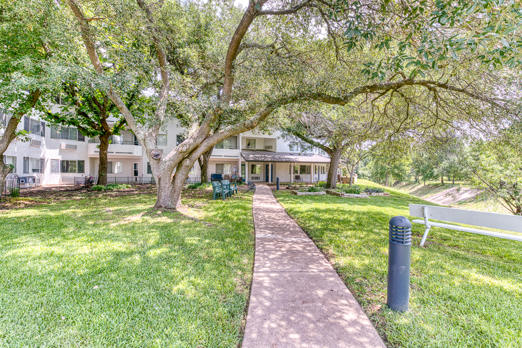 Pathway leading to an outdoor seating area at the facility