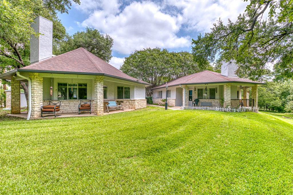 Exterior view of senior living cottages surrounded by grass