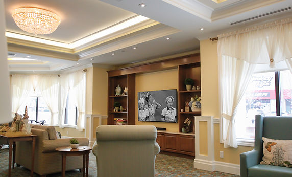 Cozy common area with comfortable seating and a television