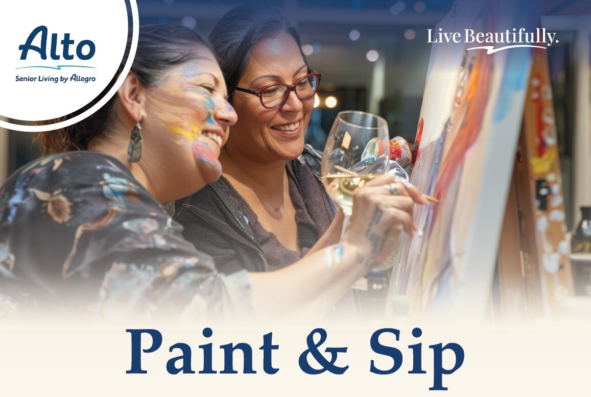 Residents enjoying a painting activity with wine