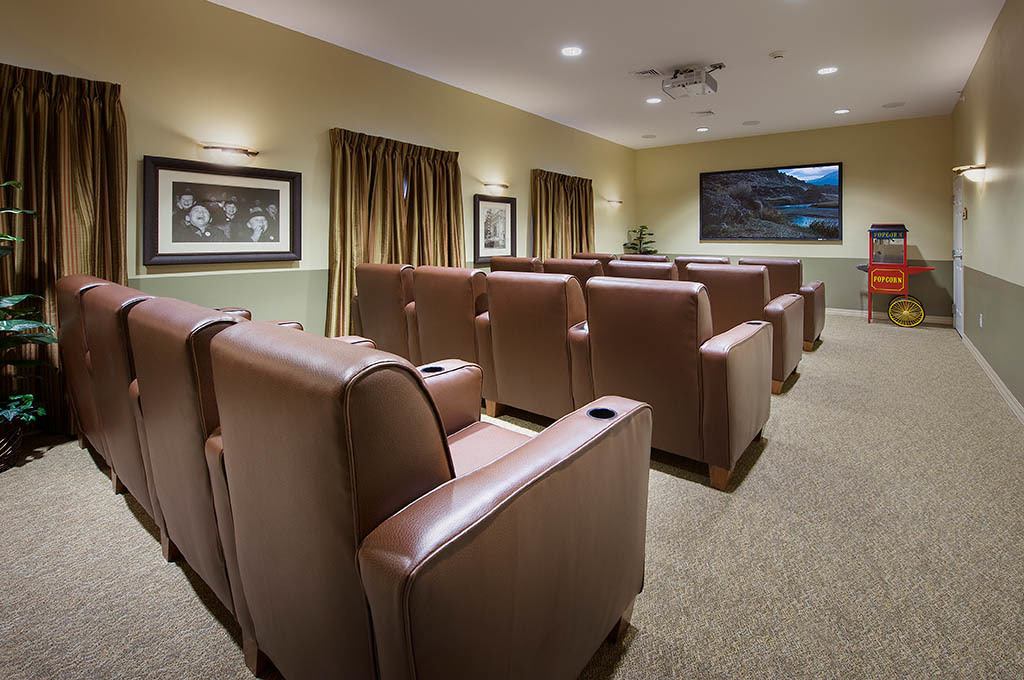 Interior view of a movie theater-style room with seating