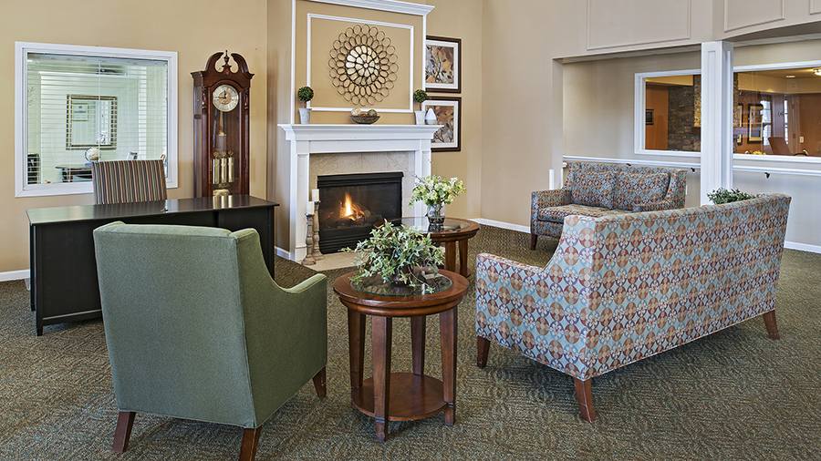 Common area with seating and a fireplace
