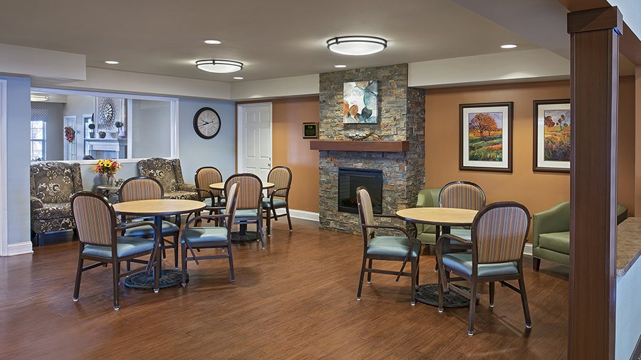 Common area with seating and a fireplace