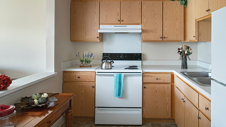 Interior kitchen with appliances and decor