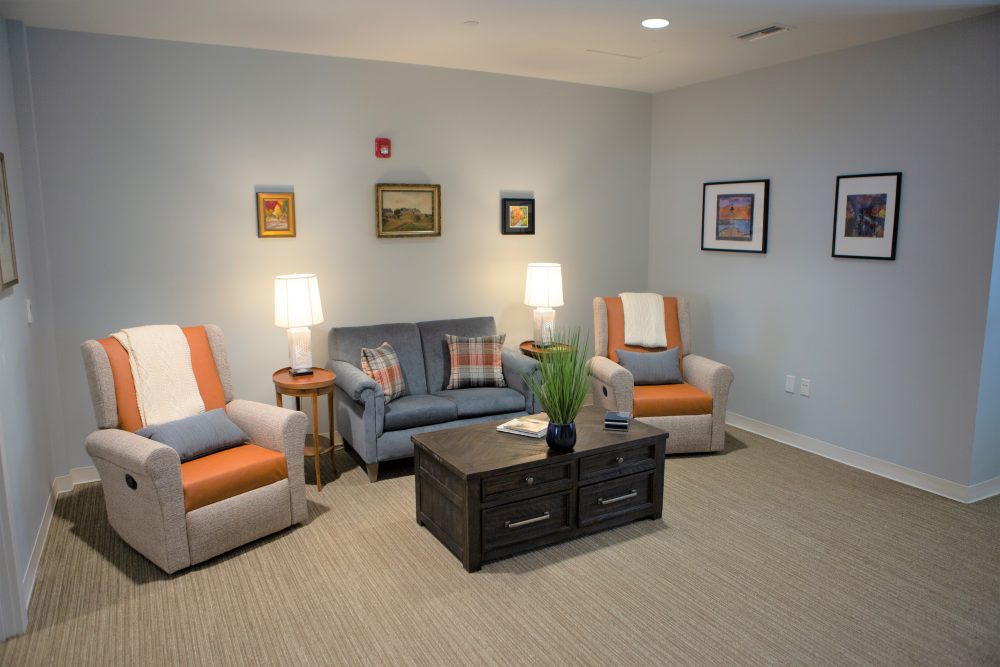 Cozy common area with seating and artwork
