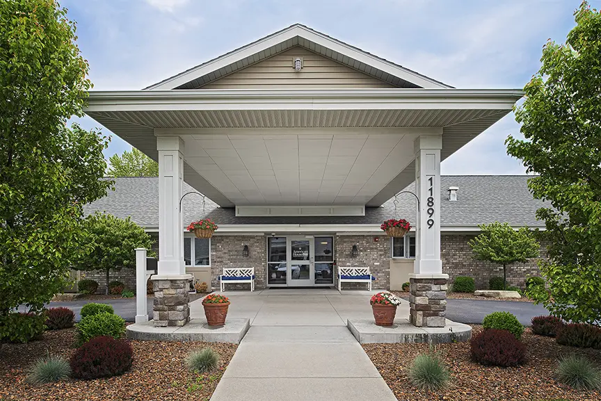 Welcome entrance of American House Wildwood with landscaping