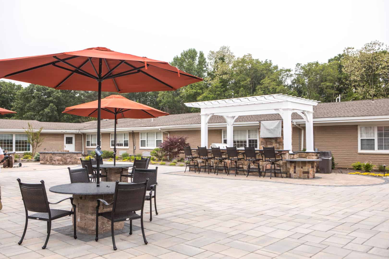 Outdoor seating area with umbrellas and patio