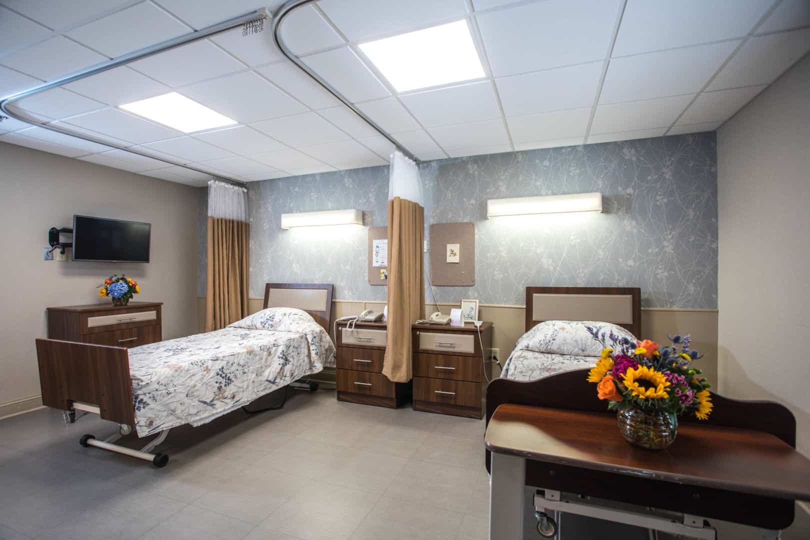 Interior view of a shared resident room with two beds
