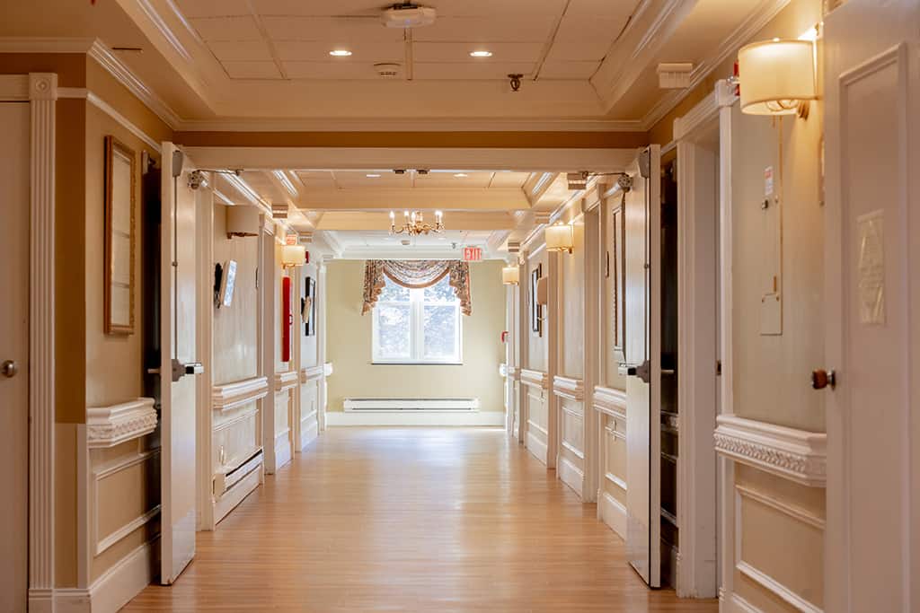 A well-lit hallway in the facility