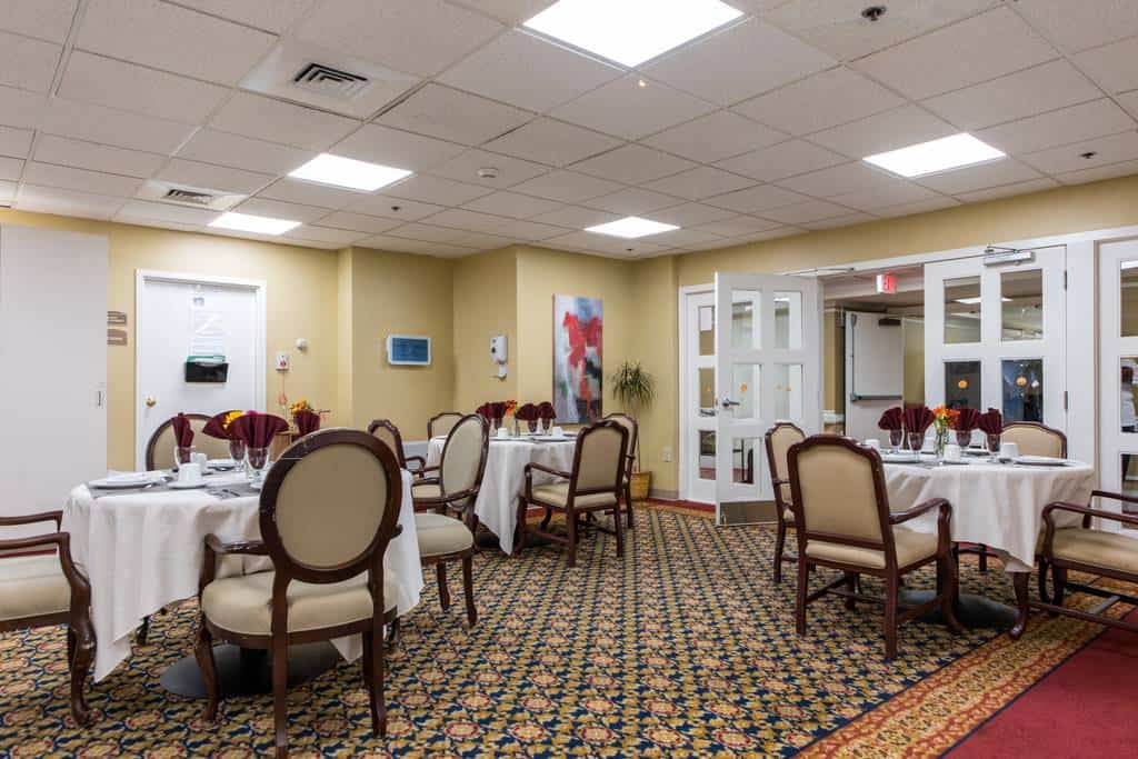 Dining room set up for mealtime with elegant decor