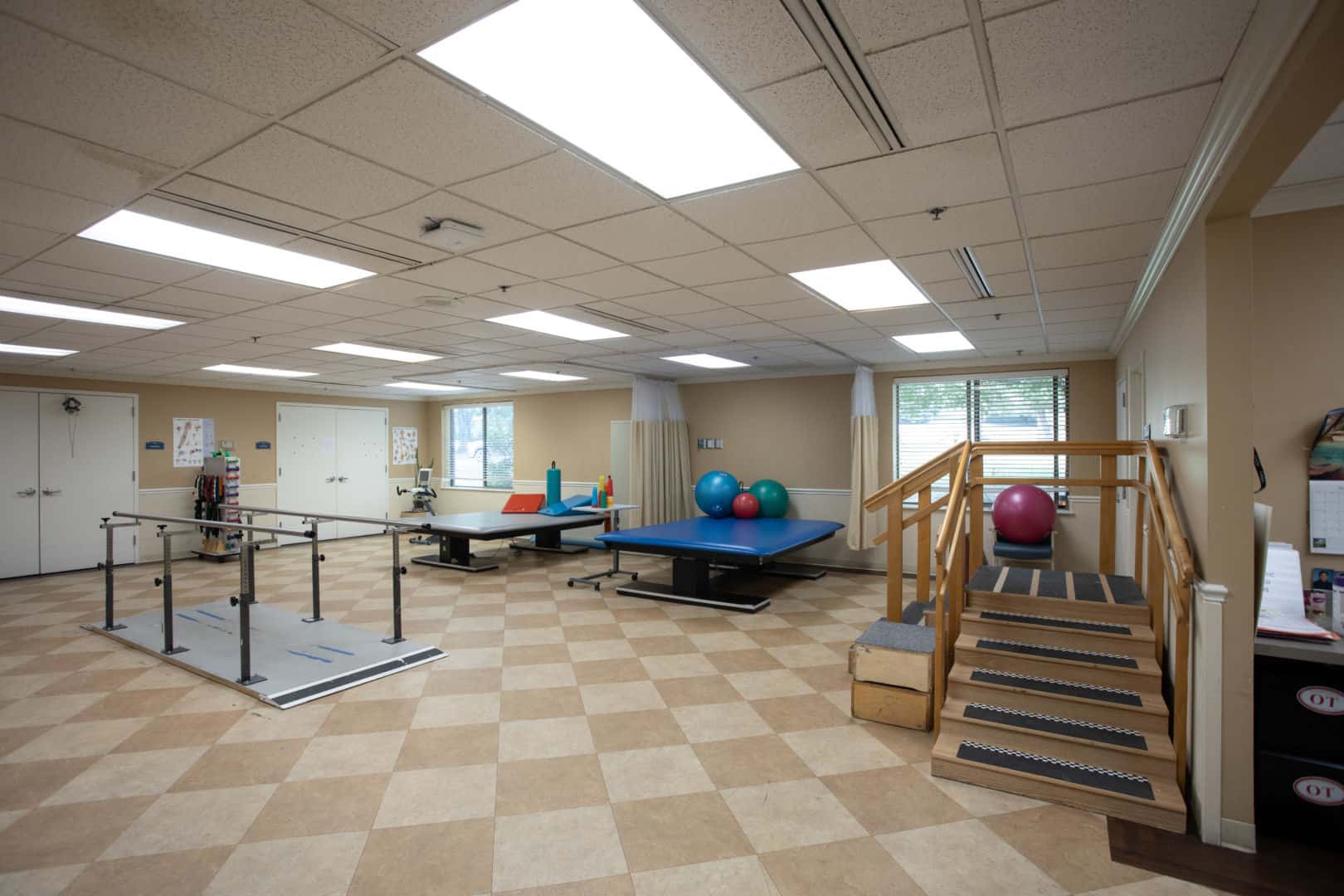 Therapy room with equipment and exercise balls