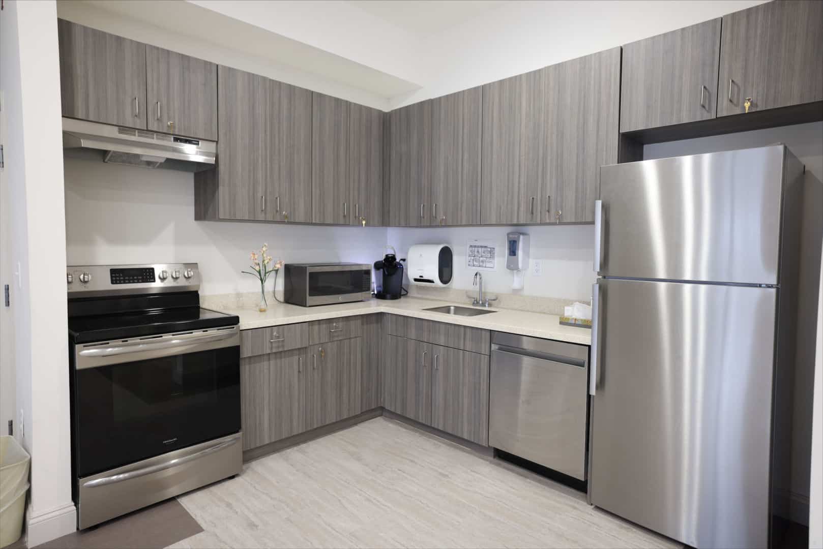 Modern kitchen space with stainless steel appliances
