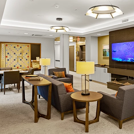 Common area with seating and a television