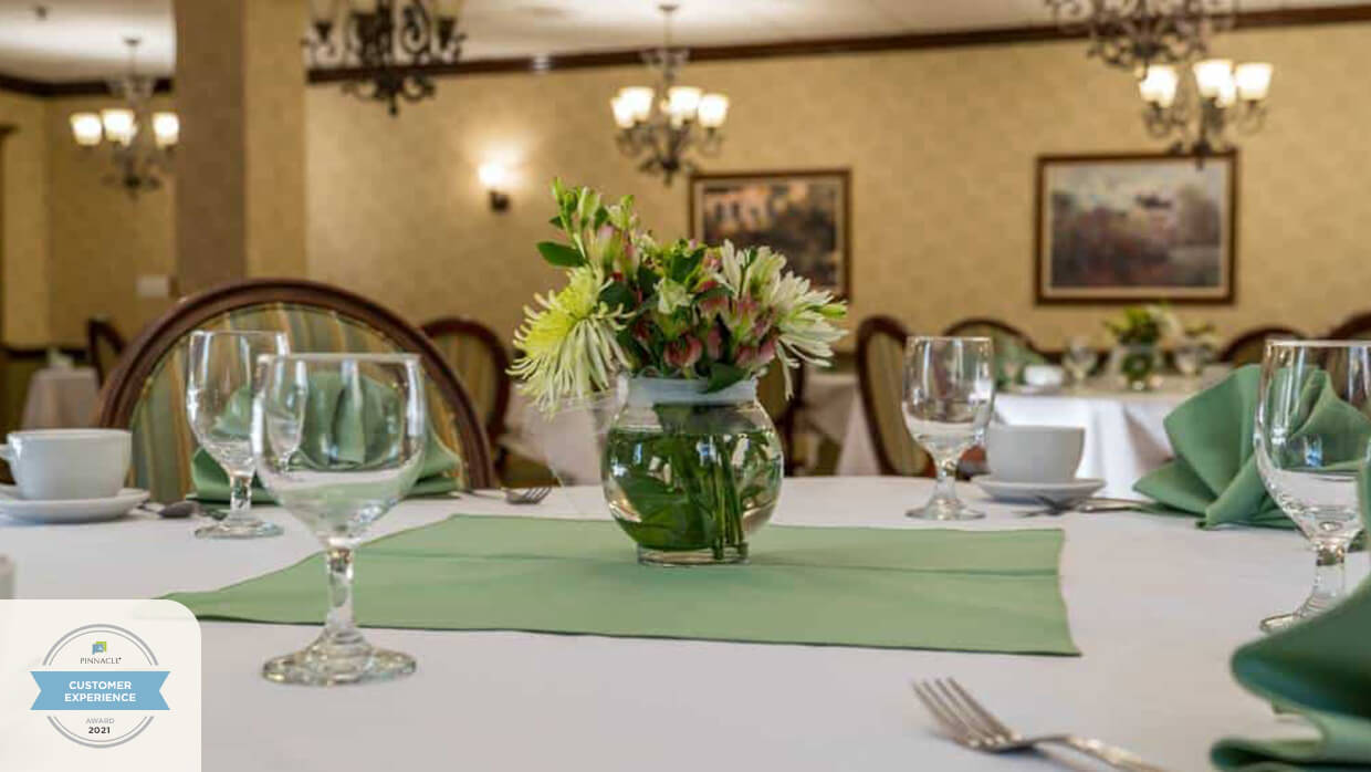 Beautifully set dining table in an elegant dining room