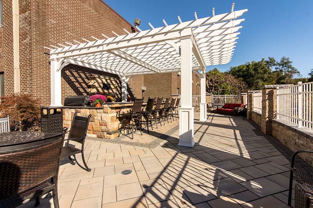 Outdoor patio area with seating and pergola