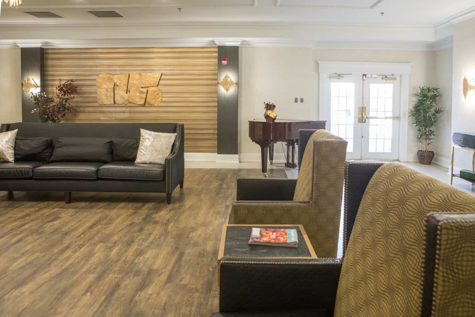 Comfortable interior lounge area with piano