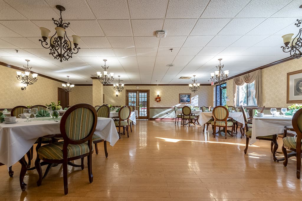 Dining area with tables and decorative lighting