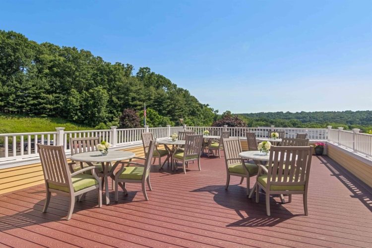Outdoor seating area with tables and views