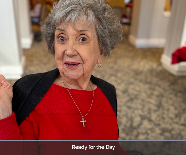 Resident smiling and engaging in common area