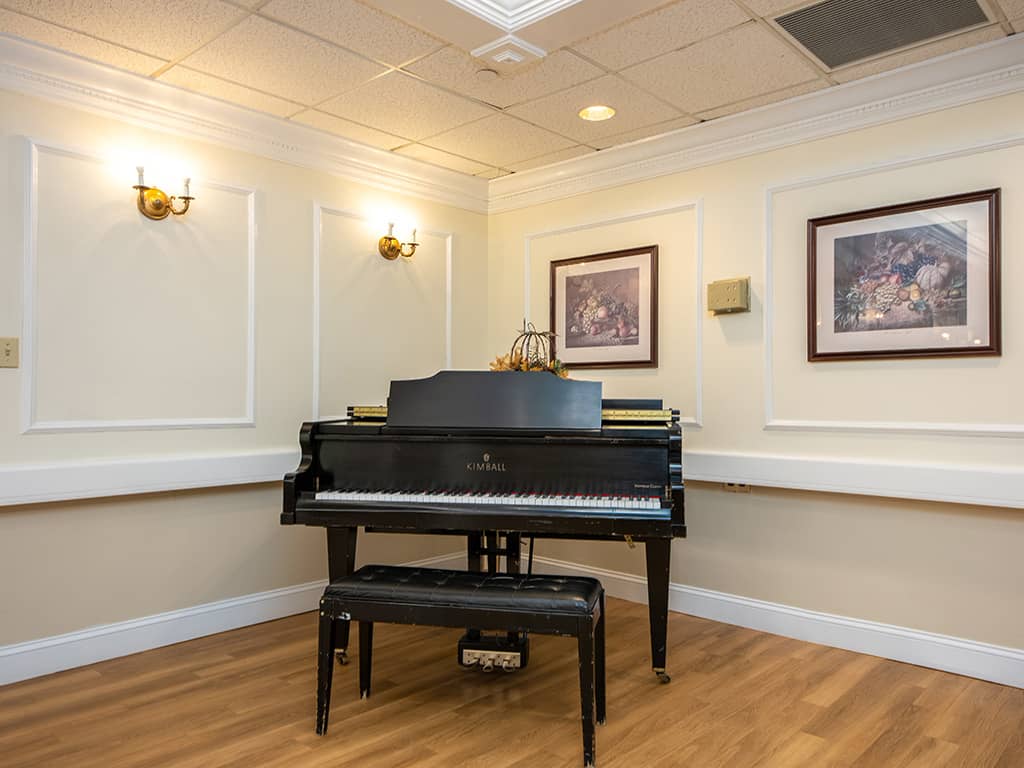 A polished piano in a quiet common area