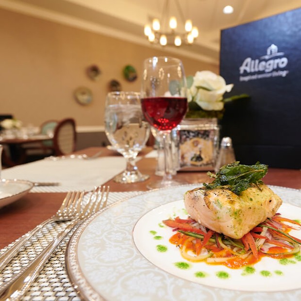 Elegantly plated salmon dish in dining area