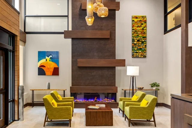 Bright common area with modern seating and decor