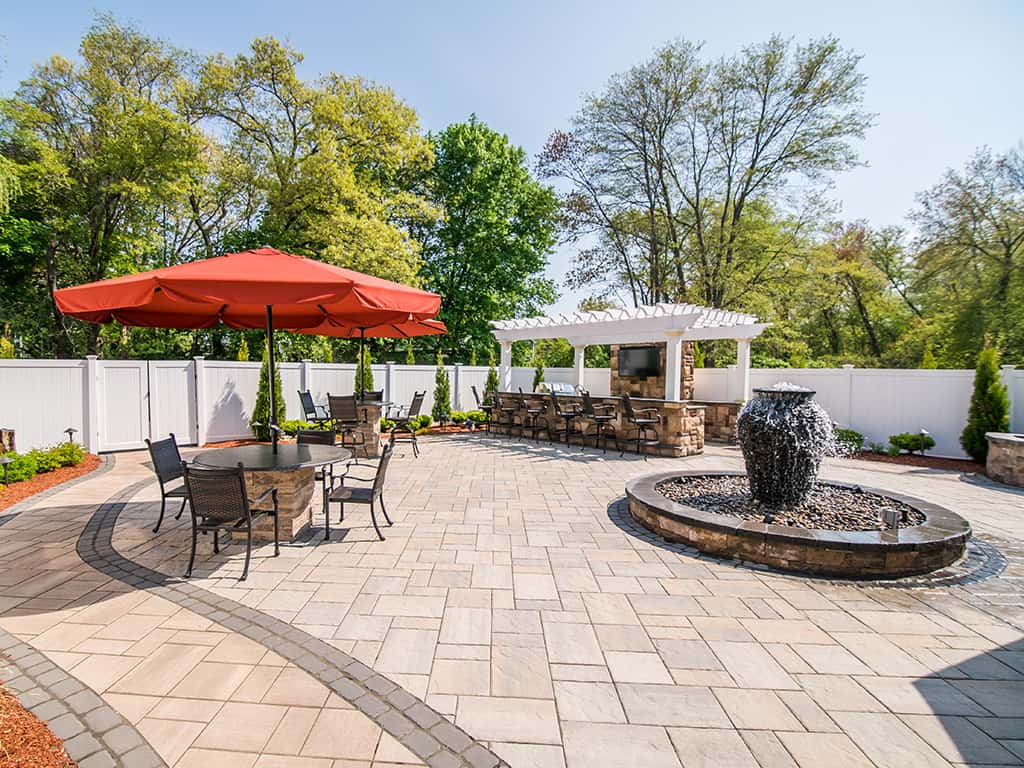 Beautiful outdoor patio with seating and fountain