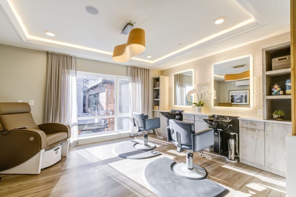 Hair salon interior with stylist chairs and natural light