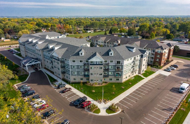 Aerial view of Hayden Grove Senior Living building and parking lot