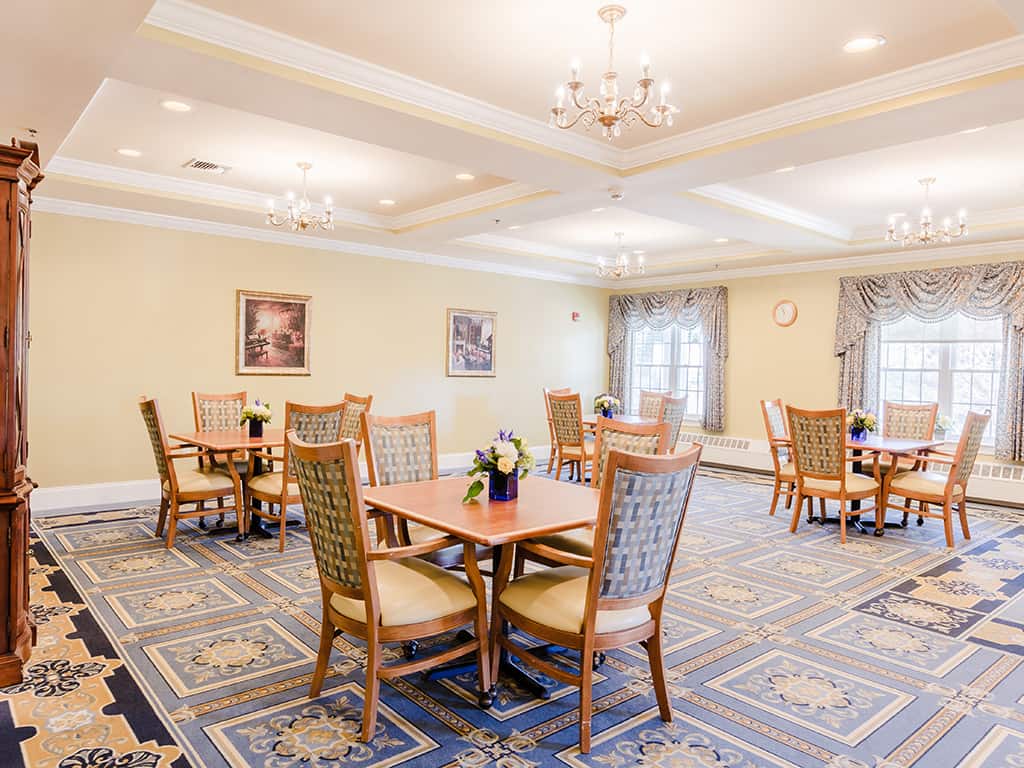 Bright dining room with tables and chairs