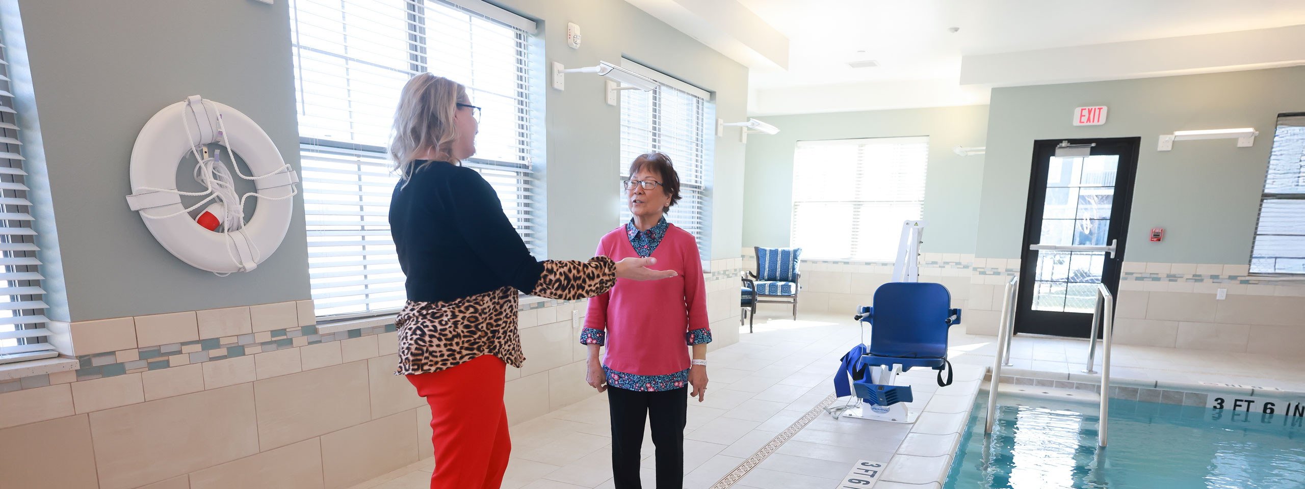 Wellness activity in a bright indoor pool area