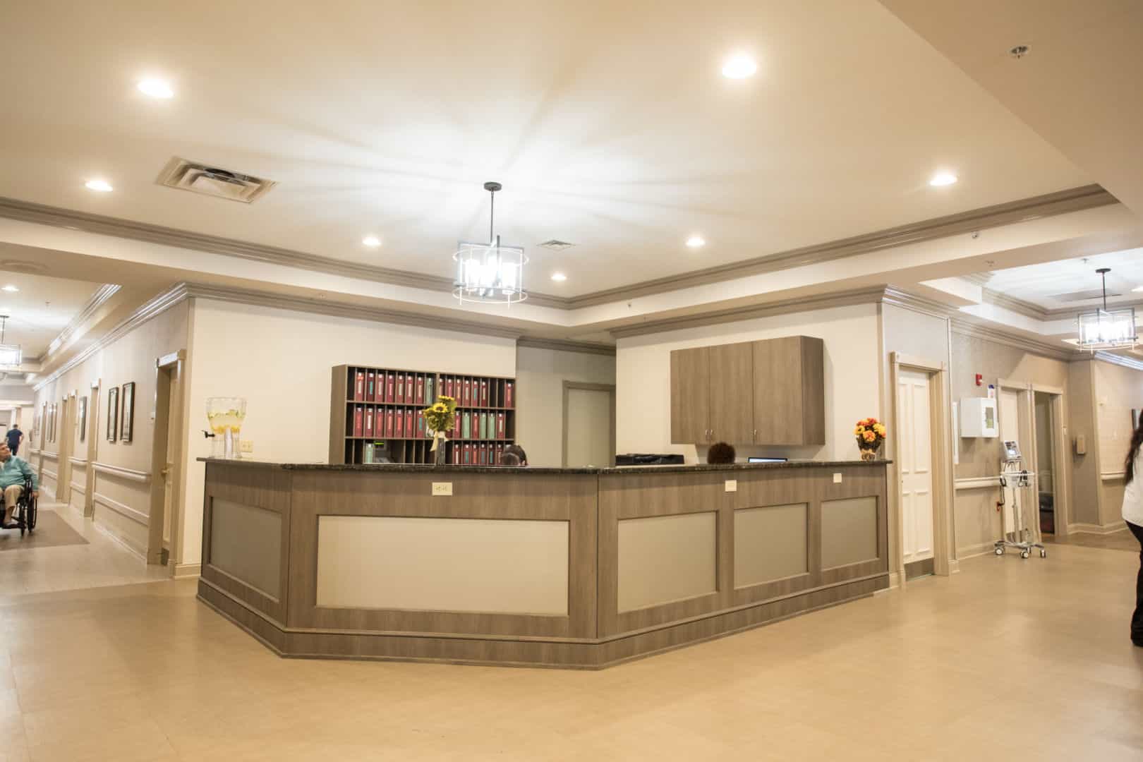 Bright and welcoming reception area with staff and residents