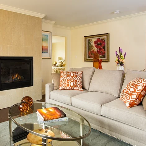 Cozy living room with a fireplace and floral decor