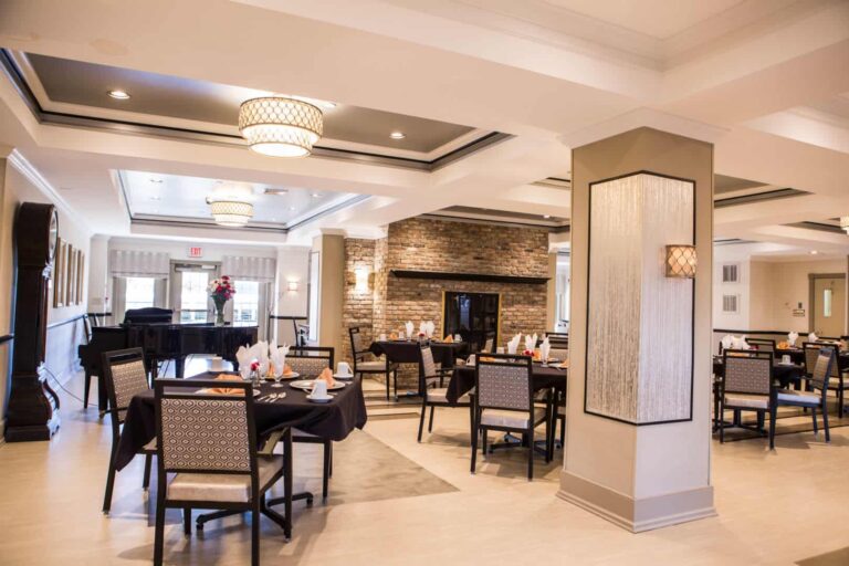Elegant dining room with tables set for a meal