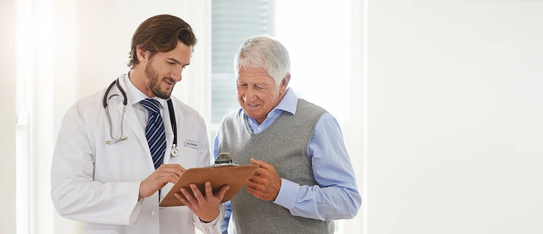A doctor discussing with a senior resident
