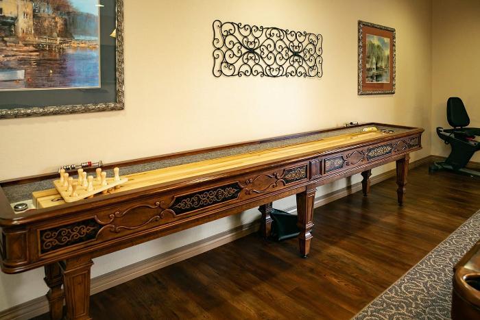 Shuffleboard table in a common area