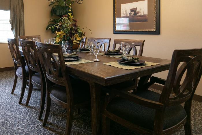 Elegant dining room setup with floral centerpiece
