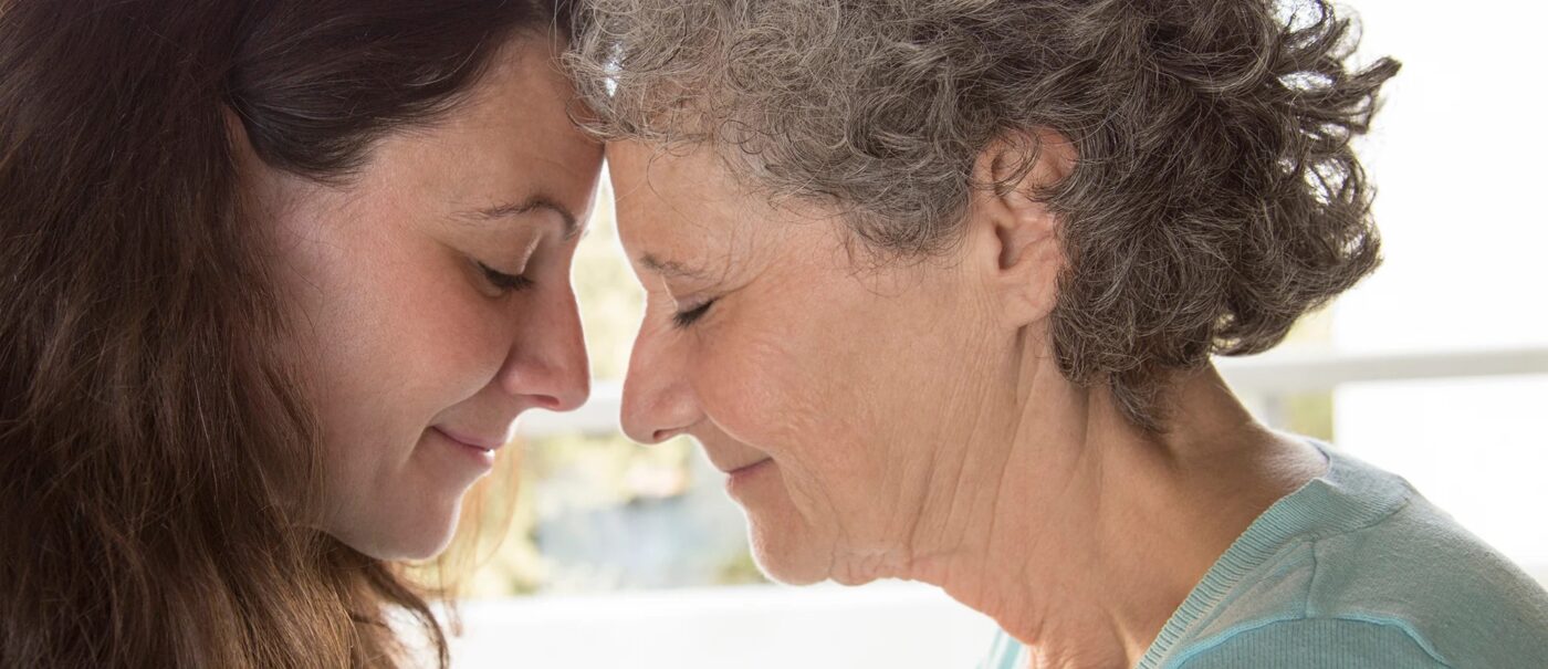 Two women sharing a tender moment