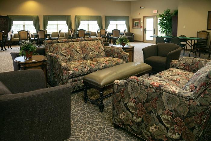 Common area with floral sofas and chairs