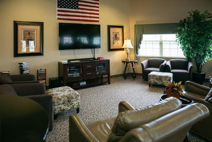 Cozy common area with seating and television