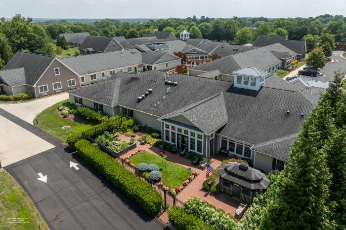 Aerial view of the senior living facility surrounded by greenery