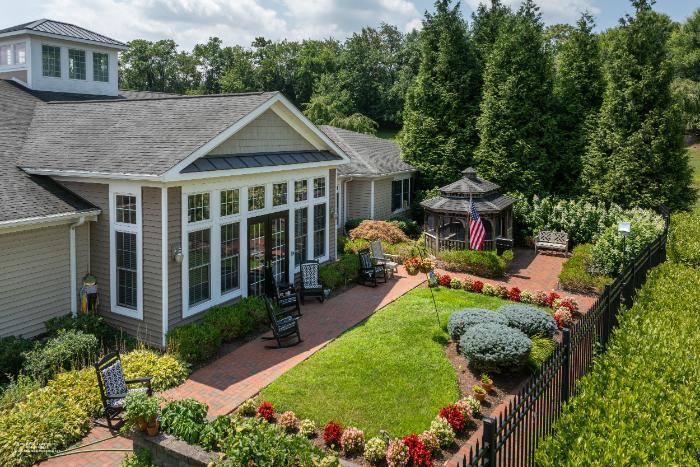 Outdoor garden area with seating and landscaping