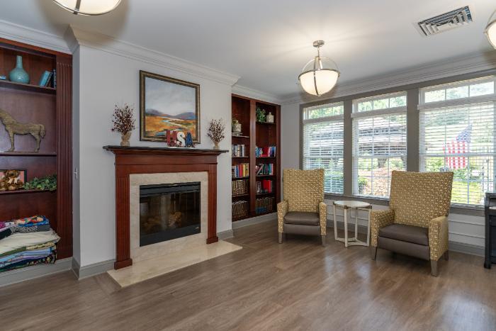 Cozy common area with seating and a fireplace